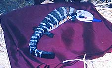 A blue tongue lizard scarecrow