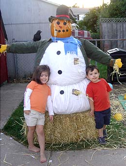 A snowman scarecrow